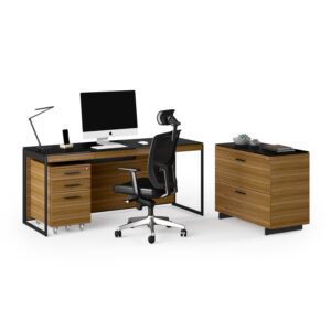 Sequel Desk by BDI with tempered glass top and walnut detailing. Shown with Sequel mobile file pedestal and Sequel credenza.