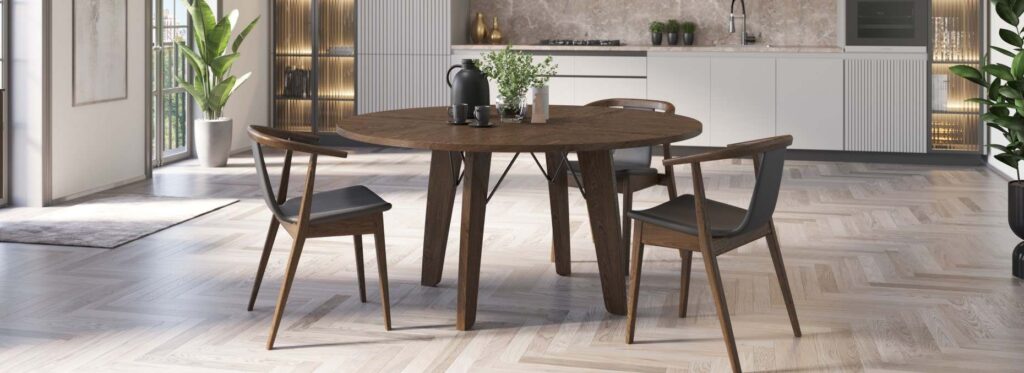 Round smoked oak dining table by Skovby of Denmark with midcentury modern style chairs